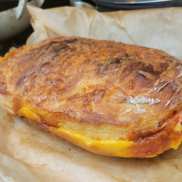 Golden cheese sourdough loaf